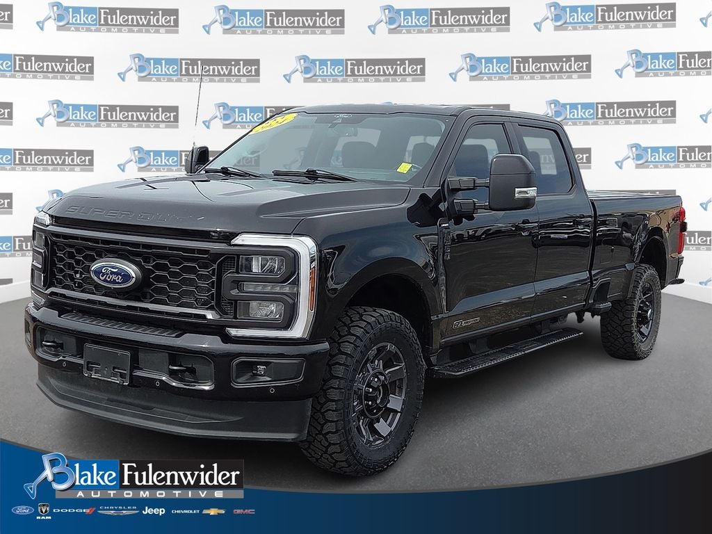 2024 Ford F-350SD Lariat in Black Metallic — front three-quarter view