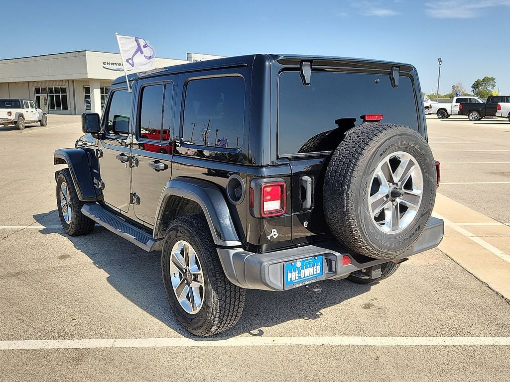 2018 Jeep Wrangler — rear three-quarter view