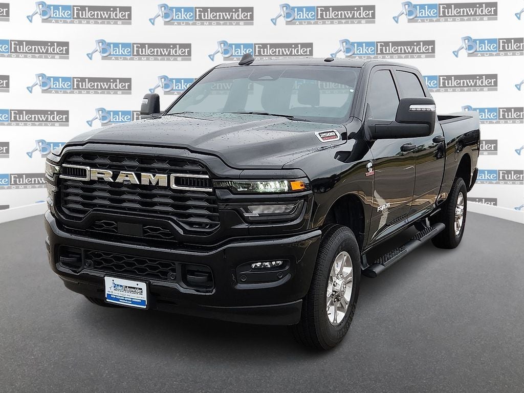 2025 RAM 2500 Big Horn in Diamond Black Crystal Pearlcoat — front three-quarter view