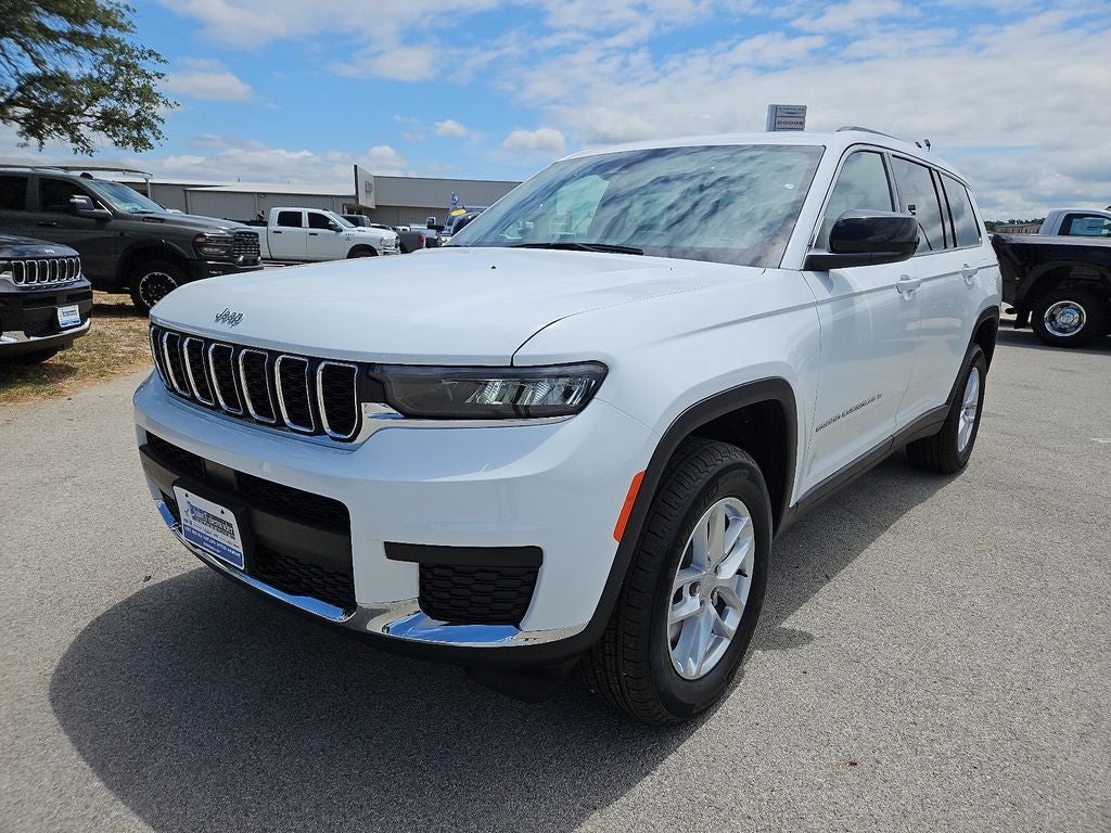 2026 Jeep Grand Cherokee GRAND CHEROKEE L LAREDO X 4X4 in Bright White Clear-Coat Exterior Paint — front three-quarter view