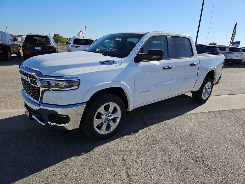 2026 RAM 1500 RAM 1500 BIG HORN CREW CAB 4X2 5'7' BOX in Bright White Clear-Coat Exterior Paint — front three-quarter view