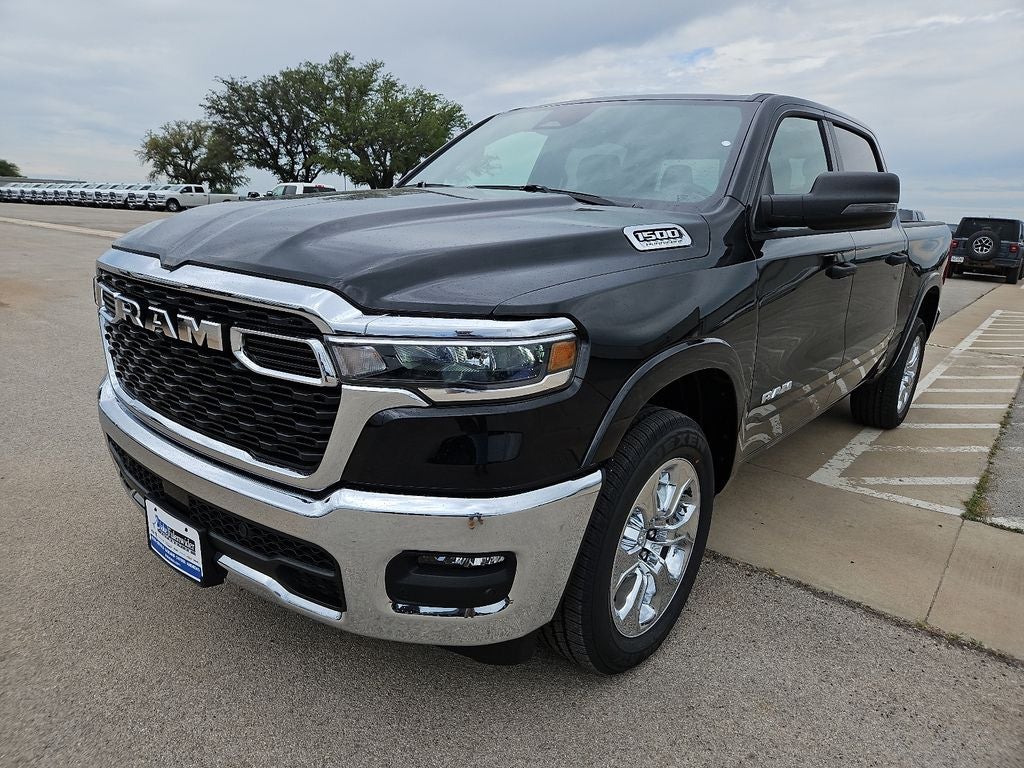 2026 RAM 1500 RAM 1500 BIG HORN CREW CAB 4X2 5'7' BOX in Diamond Black Crystal Pearlcoat — front three-quarter view