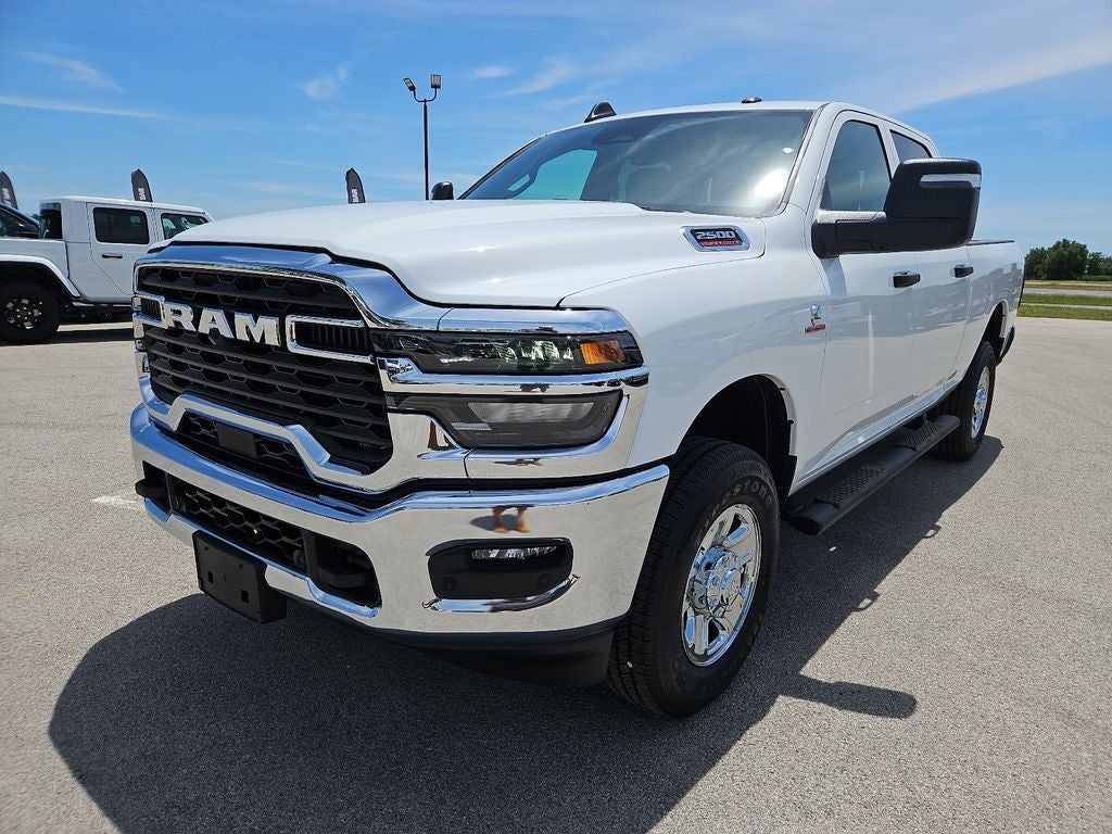 2026 RAM 2500 RAM 2500 TRADESMAN CREW CAB 4X4 6'4' BOX in Bright White Clear-Coat Exterior Paint — front three-quarter view