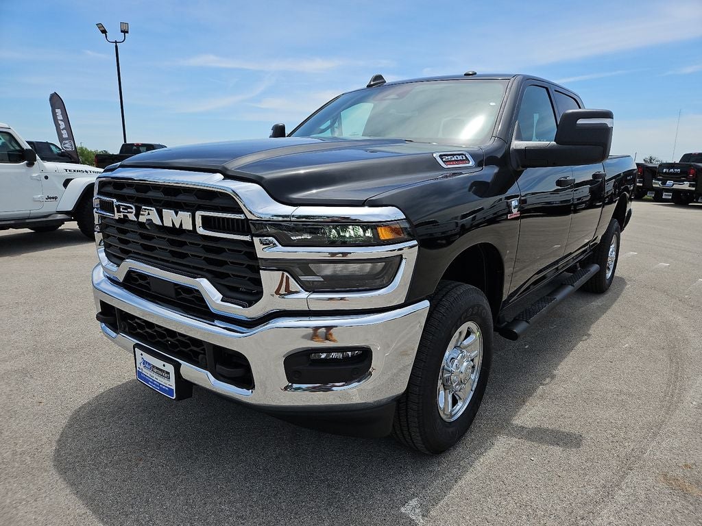2026 RAM 2500 RAM 2500 TRADESMAN CREW CAB 4X4 6'4' BOX in Diamond Black Crystal Pearl-Coat Exterior Paint — front three-quarter view