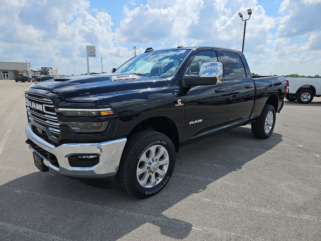 2026 RAM 2500 RAM 2500 LARAMIE CREW CAB 4X4 6'4' BOX in Diamond Black Crystal Pearl-Coat Exterior Paint — front three-quarter view