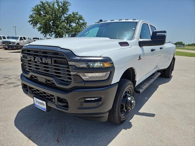 2026 RAM 3500 RAM 3500 TRADESMAN CREW CAB 4X4 8' BOX in Bright White Clear-Coat Exterior Paint — front three-quarter view