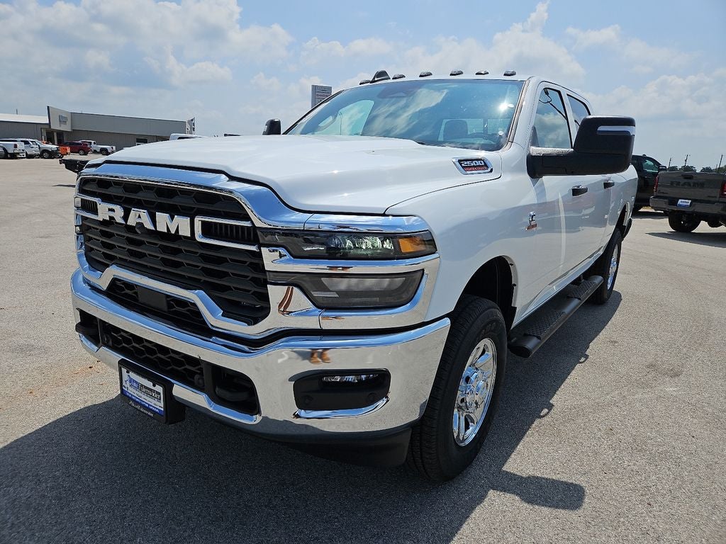 2026 RAM 2500 RAM 2500 TRADESMAN CREW CAB 4X4 6'4' BOX in Bright White Clear-Coat Exterior Paint — front three-quarter view