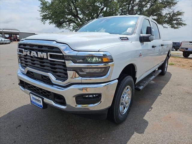 2026 RAM 2500 RAM 2500 TRADESMAN CREW CAB 4X4 8' BOX in Bright White Clear-Coat Exterior Paint — front three-quarter view