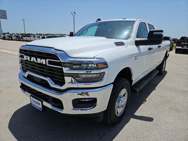 2026 RAM 2500 RAM 2500 TRADESMAN CREW CAB 4X4 8' BOX in Bright White Clear-Coat Exterior Paint — front three-quarter view