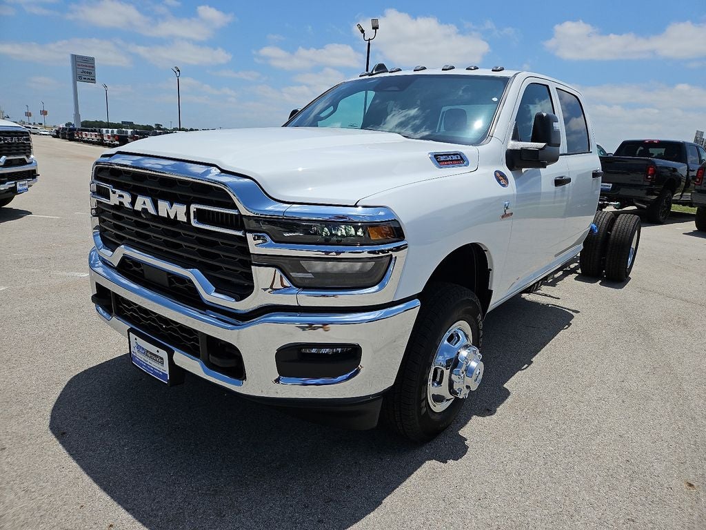 2026 RAM 3500 Chassis Cab RAM 3500 TRADESMAN CREW CAB CHASSIS 4X4 60' CA in Bright White Clear-Coat Exterior Paint — front three-quarter...