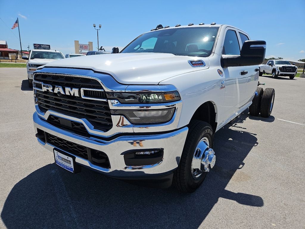 2026 RAM 3500 Chassis Cab RAM 3500 TRADESMAN CREW CAB CHASSIS 4X4 60' CA in Bright White Clear-Coat Exterior Paint — front three-quarter...