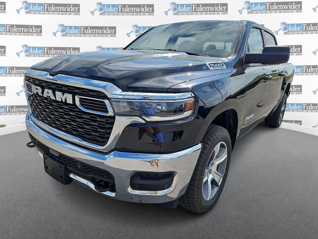 2026 RAM 1500 Tradesman in Diamond Black Crystal Pearlcoat — front three-quarter view
